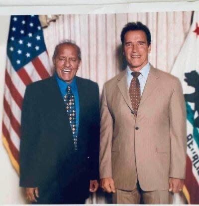 Yogi Ramesh with Arnold Schwarzenegger